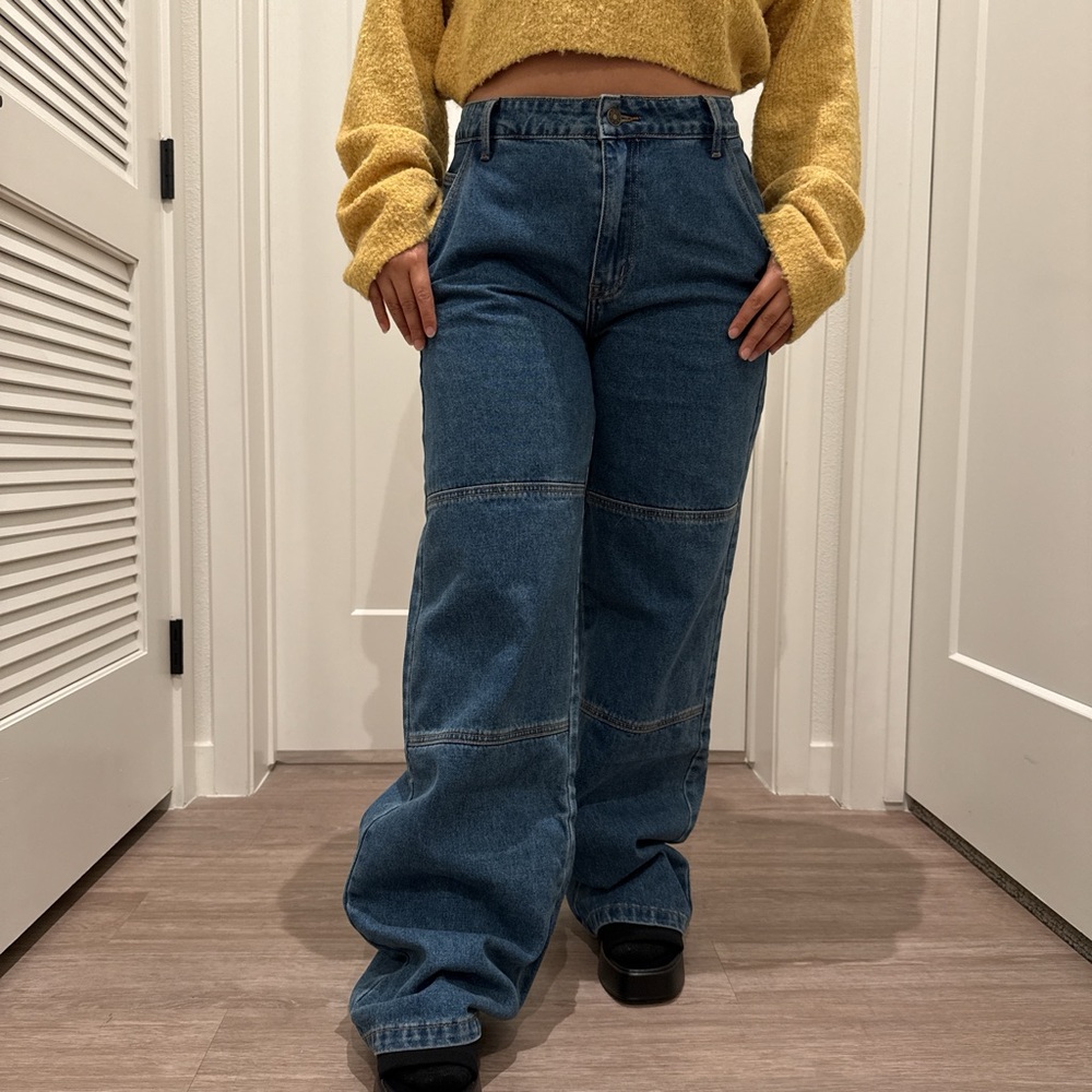 Baggy Blue Jeans 
Model is 4’11 so the jeans are quite long 
Tag on, never used